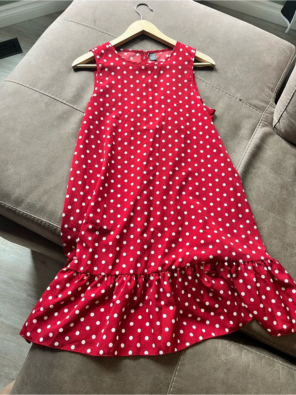 Red sleeveless polka dot dress